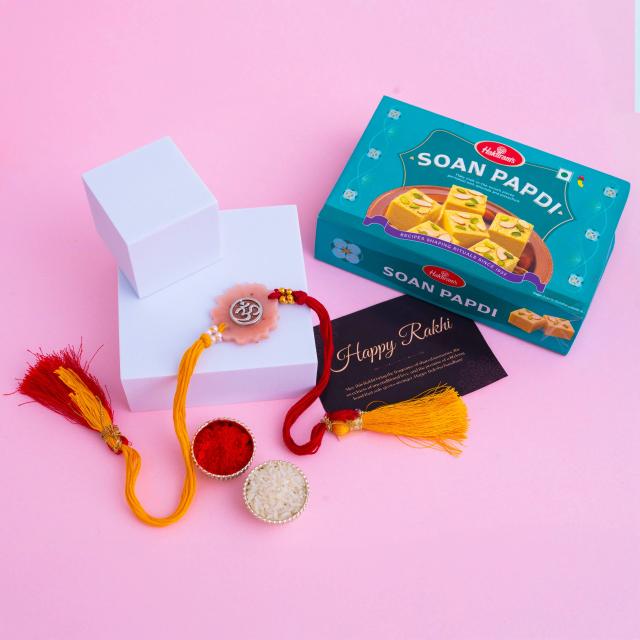 Divine Om Resin Rakhi with Soan Papdi Delight