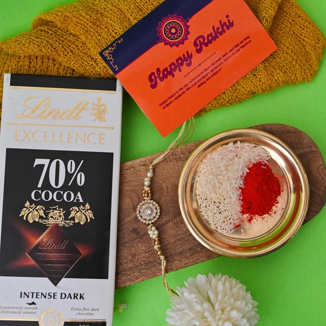 Elegant Pearl Rakhi and Lindt Chocolate Bar Combo