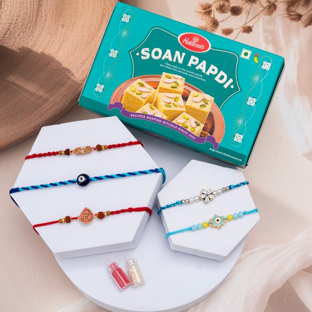 Exquisite Rakhi Ensemble with Soan Papdi Delight