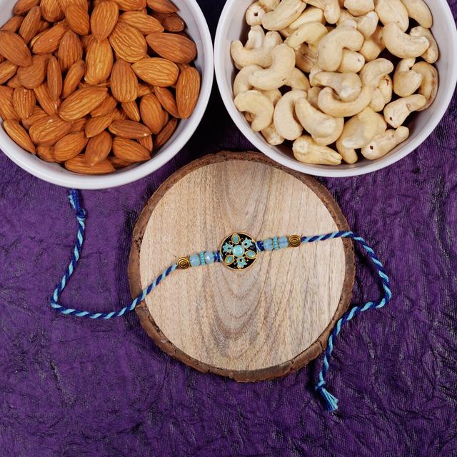 Serene Blue Stone Rakhi with Nutty Delight Combo