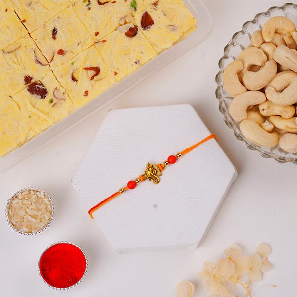 Divine Blessings Rakhi Gift Set with Soan Papdi & Cashews