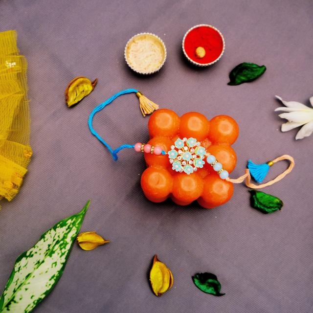 Blossoming Sibling Bond Rakhi & Treats Combo