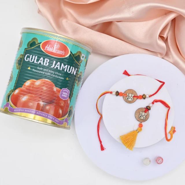 Oxidised Metal Ganesha Bhaiya Bhabhi Rakhi Set with Gulab Jamun