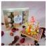 Yellow And White Ganpati Idol With Ferrero Rochers Chocolate