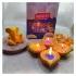 Cute Ganesha With Earthen Diyas & Rasogolla
