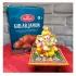 Graceful Ganesha Idol on Marble Chauki & gulab Jamun