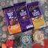 Two Diyas With Dairy Milk