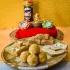 Ganesha Two Diyas With Sweets And Pringles