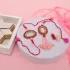 Pink Pearl Elegance Rakhi Set with Kaju Delight