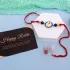 Regal Metal Rakhi Trio with Doraemon Delight