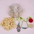 Emerald Elegance Rakhi Set with Gourmet Treats