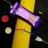 Vibrant Evil Eye Rakhi with Dairy Milk Bar Combo