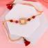 Radiant Orange Stone Rakhi with Gourmet Lindt Chocolate Bar