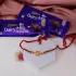Divine Om Rakhi with Dairy Milk Delight