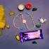 Radiant Orange Blossom Rakhi with Creamy Dairy Milk Chocolate Bar