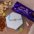 Blue Evil Eye Rakhi Blessings Gift Box with Dairy Milk & Dry Fruits