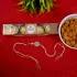 Pearl Essence Rakhi Delight with Ferrero Rocher & Almonds