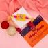 Exquisite Stone Rakhi and Motichoor Laddu Combo