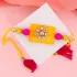 Exquisite Stone Rakhi and Motichoor Laddu Combo