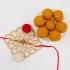 Divine Blessings Ganesha Pan Rakhi & Besan Laddu Combo