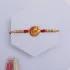 Divine Blessings Rakhi & Sweet Delights Combo