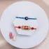 Elegant Protection & Delight Rakhi Combo with Lindt Excellence Bars
