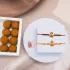 Divine Blessings Ganesha Rakhi Duo with Besan Laddu
