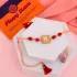 Radiant Orange Gemstone Rakhi
