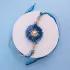Radiant Sunbeam Rakhi with Blue Elegance & Soan Papdi