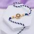 Royal Blue Stone Rakhi and 1kg Rasgulla Box Combo