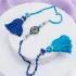 Elegant Blue Stone Rakhi with Tassel & Cham Cham Combo