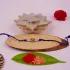 Royal Blue Crystal Rakhi with Delightful Kaju Katli Box