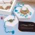 Elegant Ocean Blue Rakhi Set with Luxury Kaju Katli