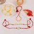 Divine Trio Stone Rakhi Set with Rasogolla Bliss