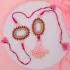 Elegant Pink Pearl Bhaiya Bhabhi Rakhi Set