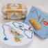 Elegant Zardosi Blue Evil Eye Rakhi Set with Sweets & Ferrero Rocher