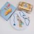 Elegant Zardosi Blue Evil Eye Rakhi Set with Sweets & Ferrero Rocher