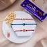 Divine Trio Rakhi Set with Cashews & Dairy Milk
