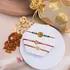 Divine Blessings Rakhi Set with Nutty Delights