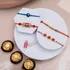 Elegant Rakhi Quartet and Ferrero Trio Gift Set