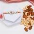 Elegant Gemstone Rakhi with Gourmet Nuts Duo