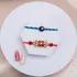 Divine Protection Rakhi Set with Sweet Soan Papdi Delight
