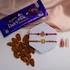 Divine Blessings Rakhi Set with Dairy Milk and Almonds