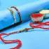 Colourful & charming Om Stone Thread Classic Rakhi